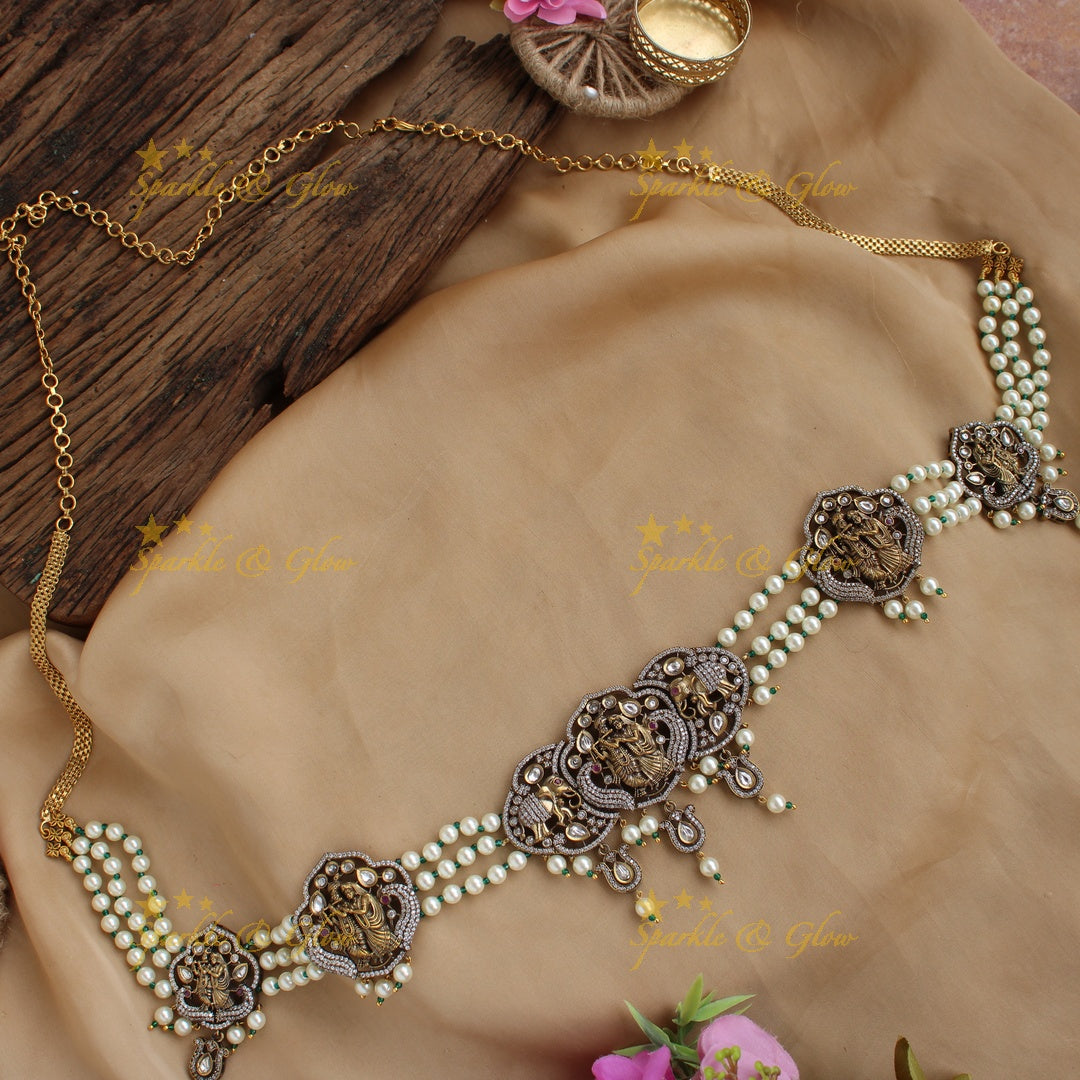 Elegant Radha krishna carved Victorian AD Hip chain with multi layer pearl chain