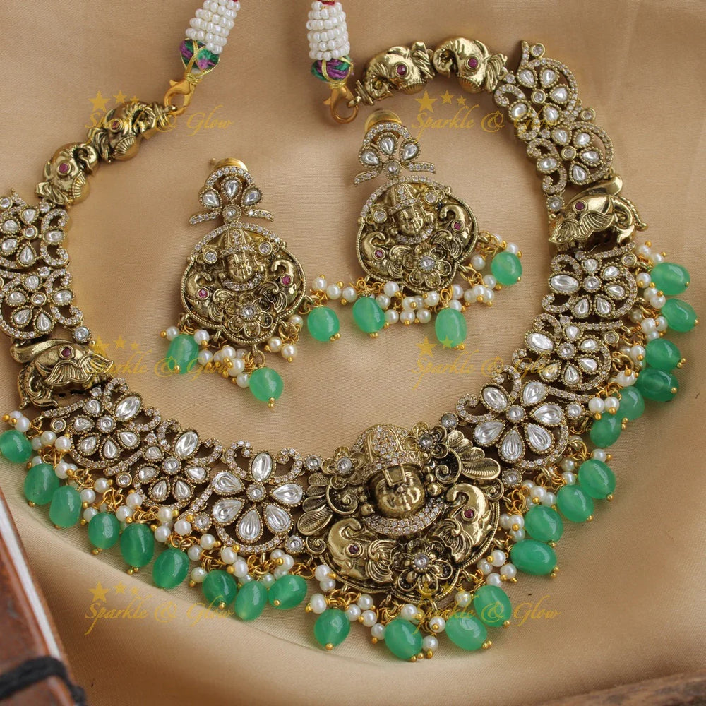 Beautiful Balaji elephant carved floral design victorian AD short necklace with pearls and green beads - Sparkle and Glow