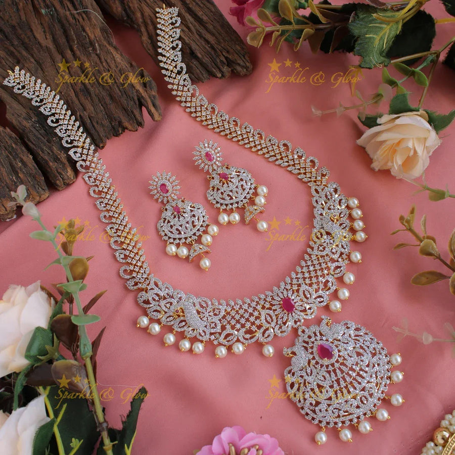 Gorgeous Peacock and floral design American diamond long necklace with pealrs and ruby - Sparkle and Glow