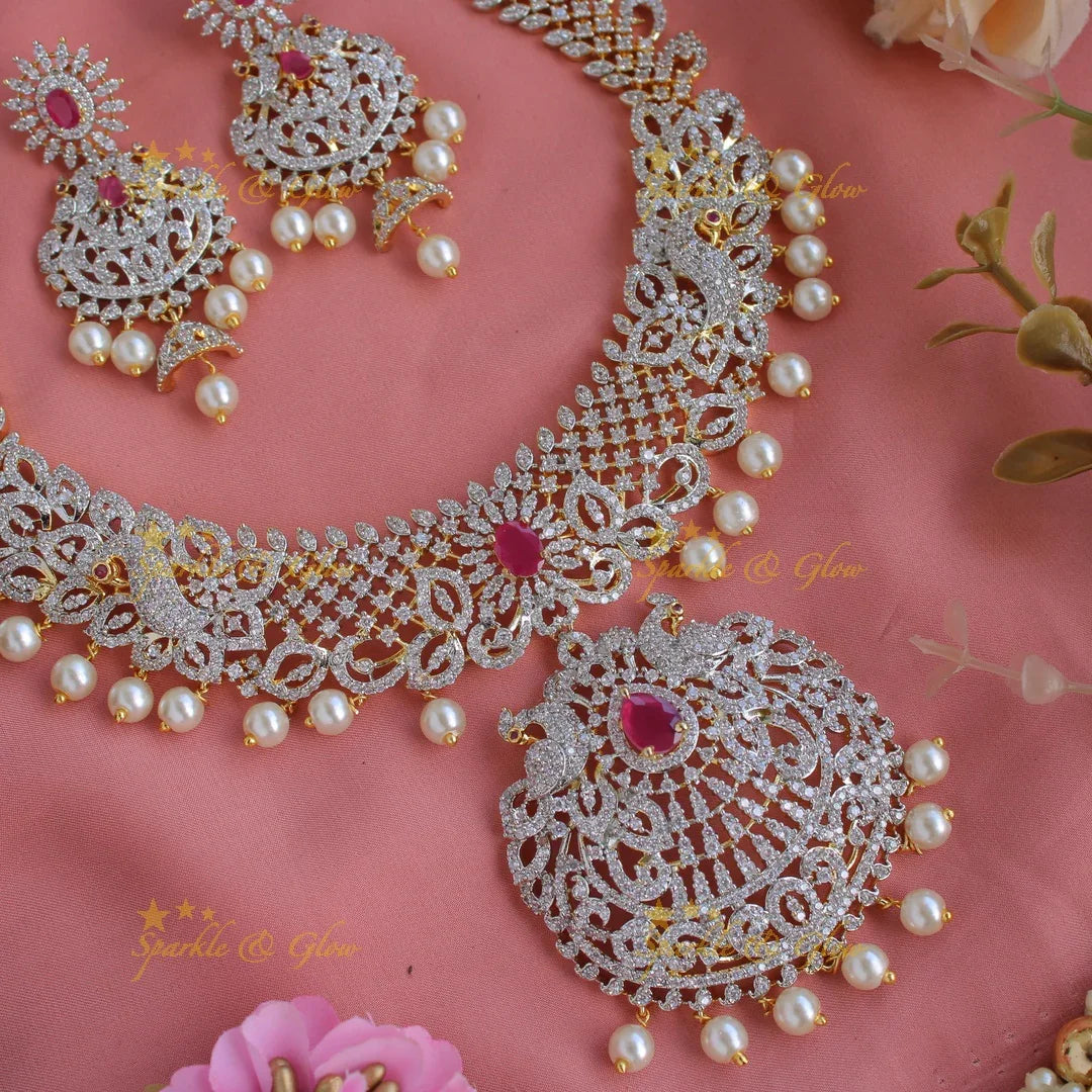 Gorgeous Peacock and floral design American diamond long necklace with pealrs and ruby - Sparkle and Glow