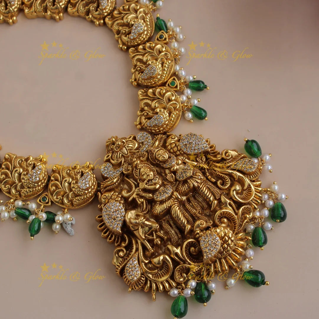 Beautiful Radha Krishna dancing peacock carved short necklace with pearls and green beads - Sparkle and Glow