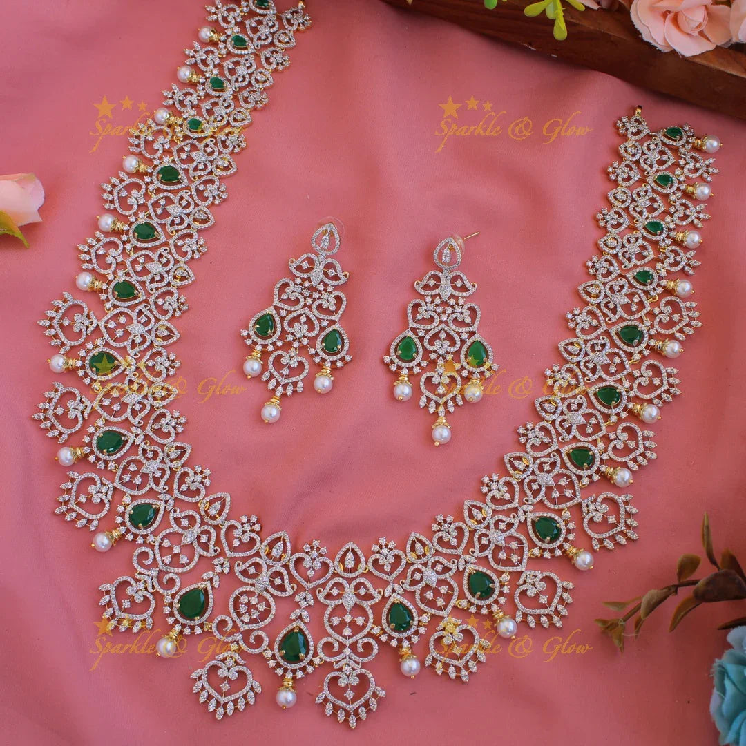 Grand intricate floral leaflet design American diamond long necklace with emerald and pearls - green - Sparkle and Glow