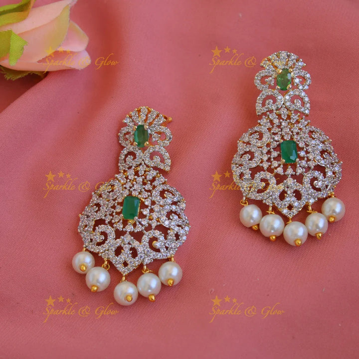 Satement Peacock floral design American diamond long necklace with emerald and pearl drops - Sparkle and Glow