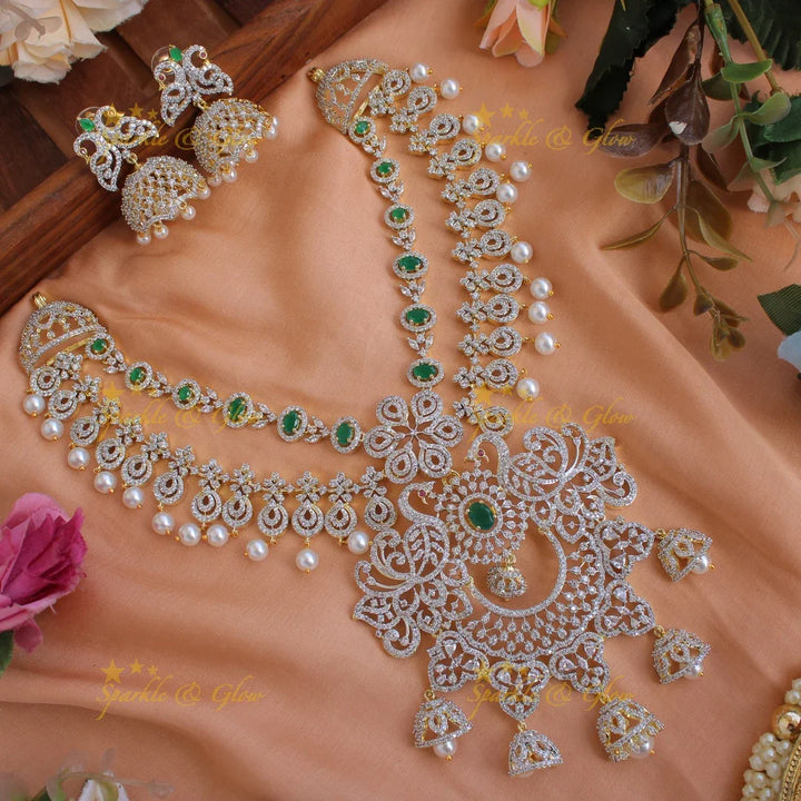 Elegant Peacock floral design American diamond layer short necklace with emerald and jhumuka drops - Sparkle and Glow