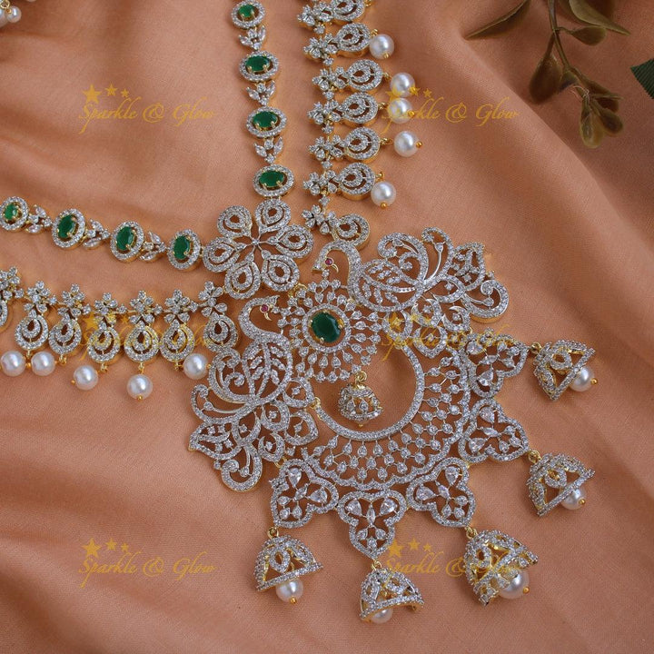 Elegant Peacock floral design American diamond layer short necklace with emerald and jhumuka drops - Sparkle and Glow