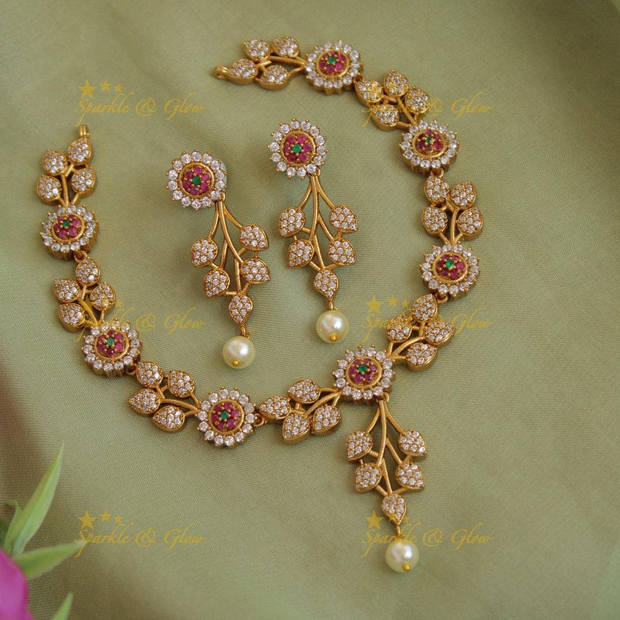 Beautiful Floral leaf design AD short necklace with ruby and pearl drops - Sparkle and Glow