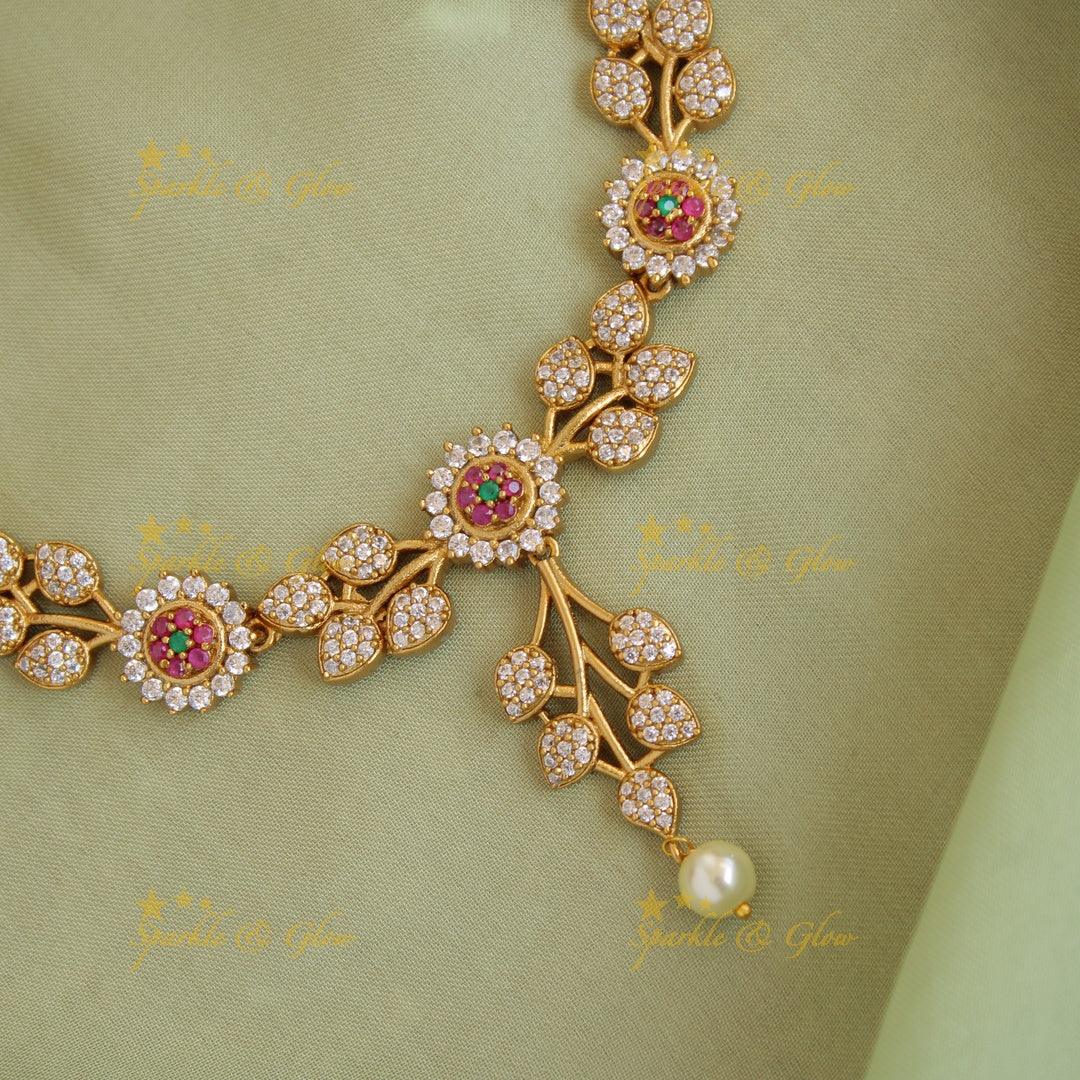 Beautiful Floral leaf design AD short necklace with ruby and pearl drops - Sparkle and Glow
