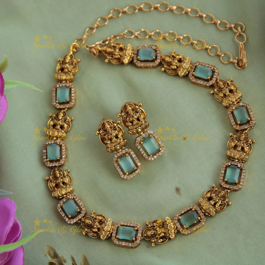 Statement Lakshmi carved AD short necklace with mint green stones - Sparkle and Glow