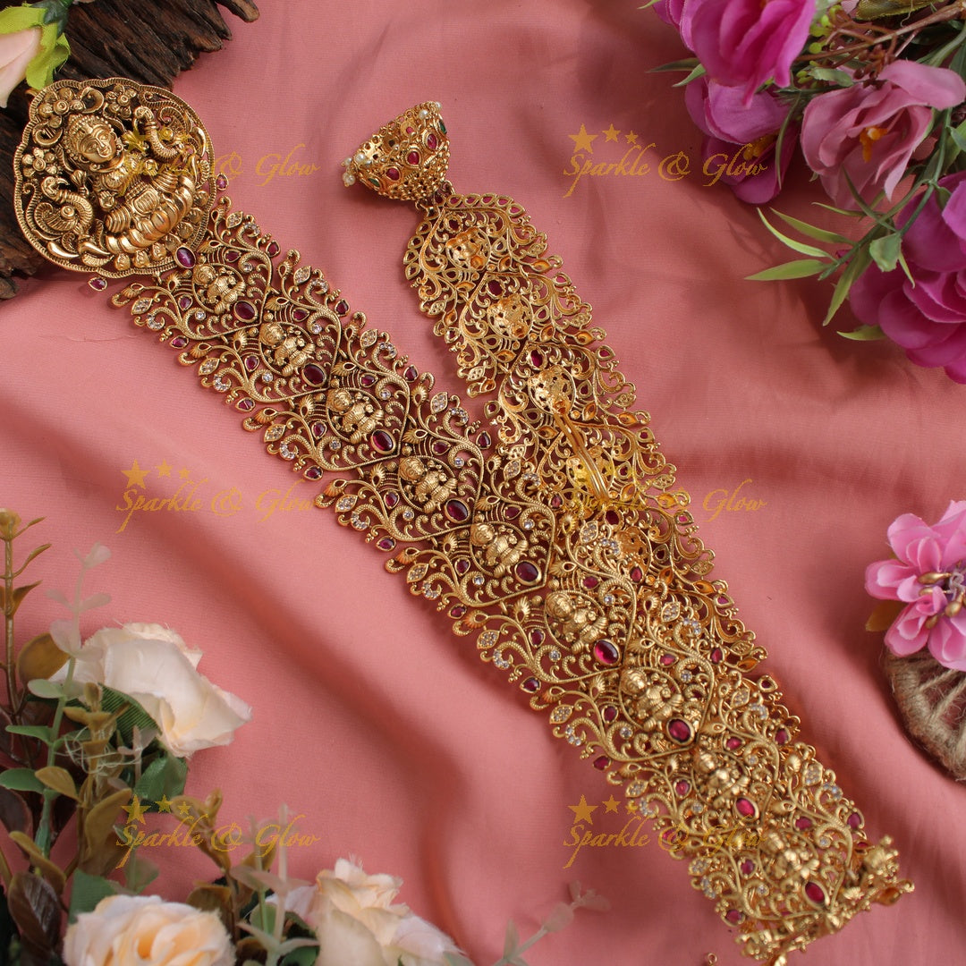 Exclusive Gold Alike intricately carved Lakshmi and Peacock Long Bridal Jada billa with Pearl beads