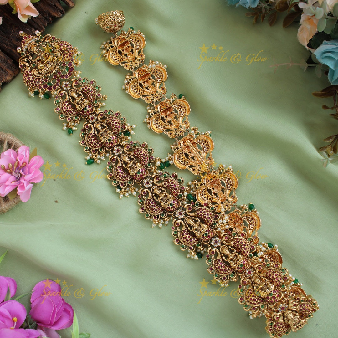 Gold Alike intricately carved Lakshmi with Peacock and floral design Long Bridal Jada billa with Green beads