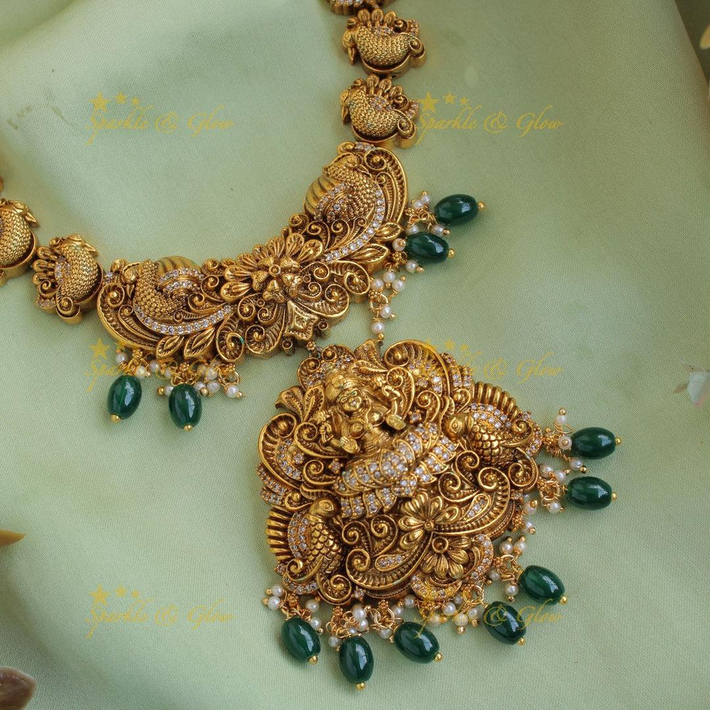 Beautiful Lakshmi peacock flower carved short necklace with CZ stones pearls and green beads - Sparkle and Glow