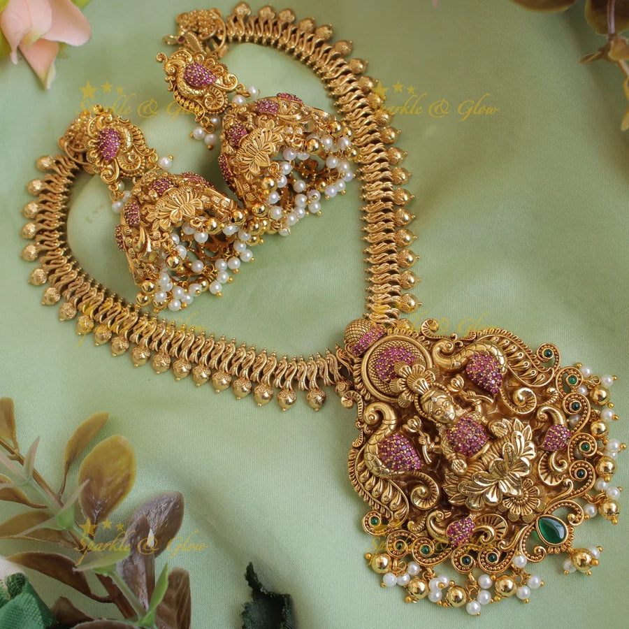 Elegant Lakshmi peacock carved short necklace with ruby emerald pearls and gold beads - Sparkle and Glow