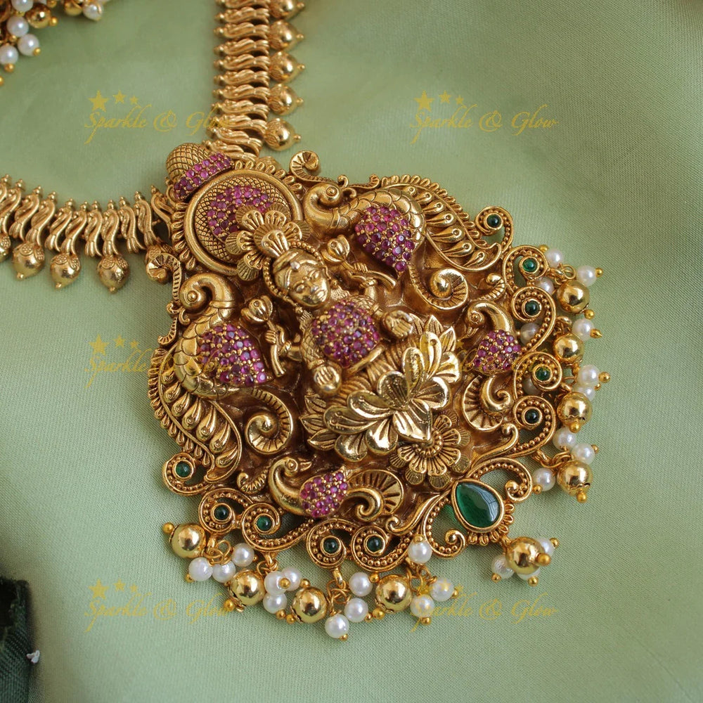 Elegant Lakshmi peacock carved short necklace with ruby emerald pearls and gold beads - Sparkle and Glow