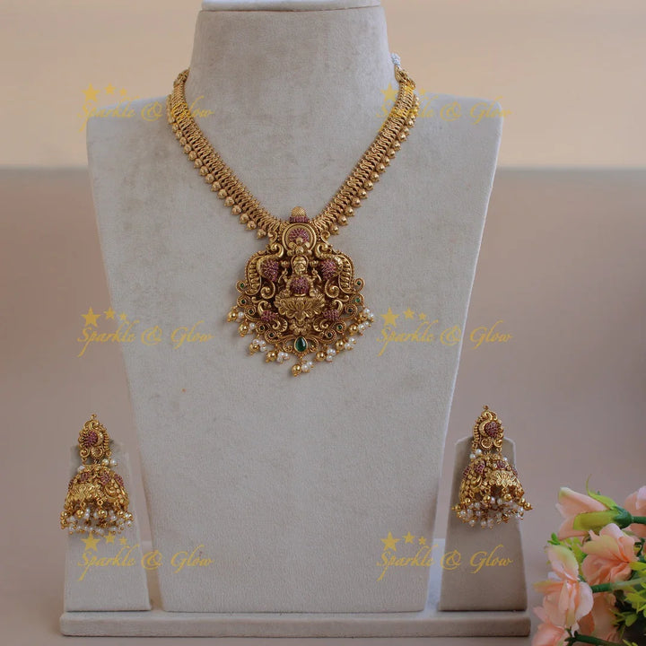 Elegant Lakshmi peacock carved short necklace with ruby emerald pearls and gold beads - Sparkle and Glow