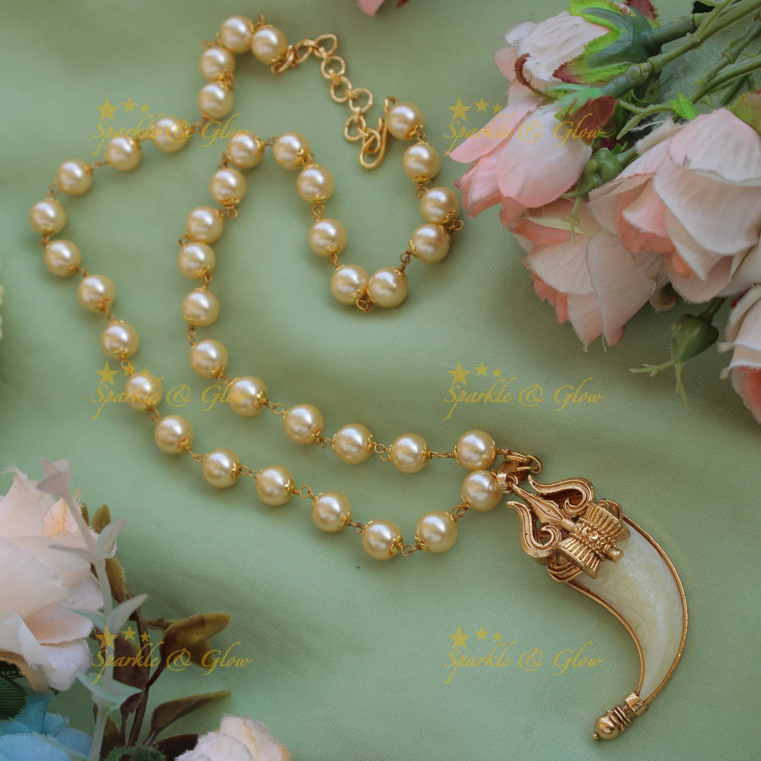Statement Trishul and damauru carved single Puliguru pendent with pearl chain