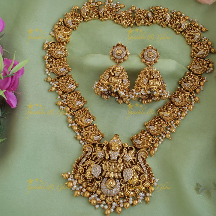 Stunning Lakshmi dancing peacock carved long necklace with CZ stones pearls and gold beads - Sparkle and Glow