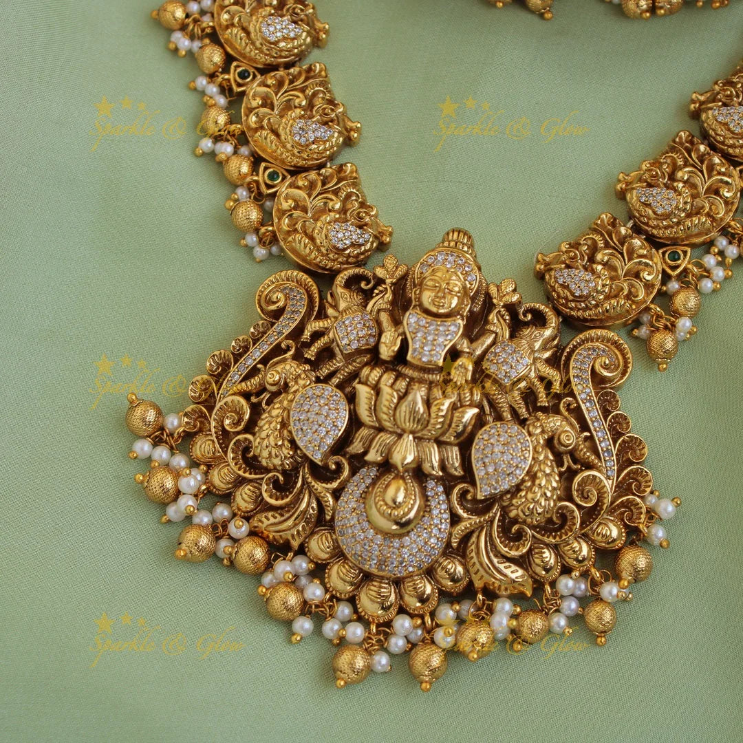 Stunning Lakshmi dancing peacock carved long necklace with CZ stones pearls and gold beads - Sparkle and Glow