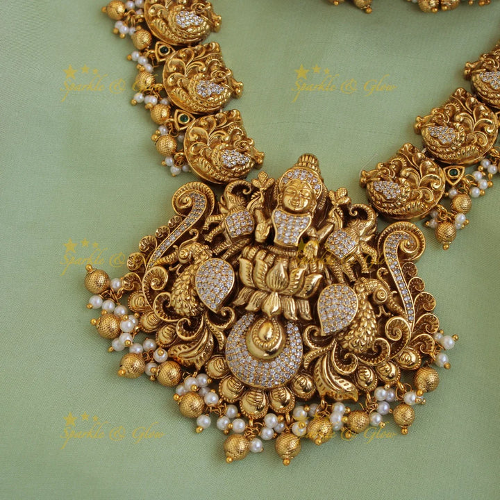 Stunning Lakshmi dancing peacock carved long necklace with CZ stones pearls and gold beads - Sparkle and Glow