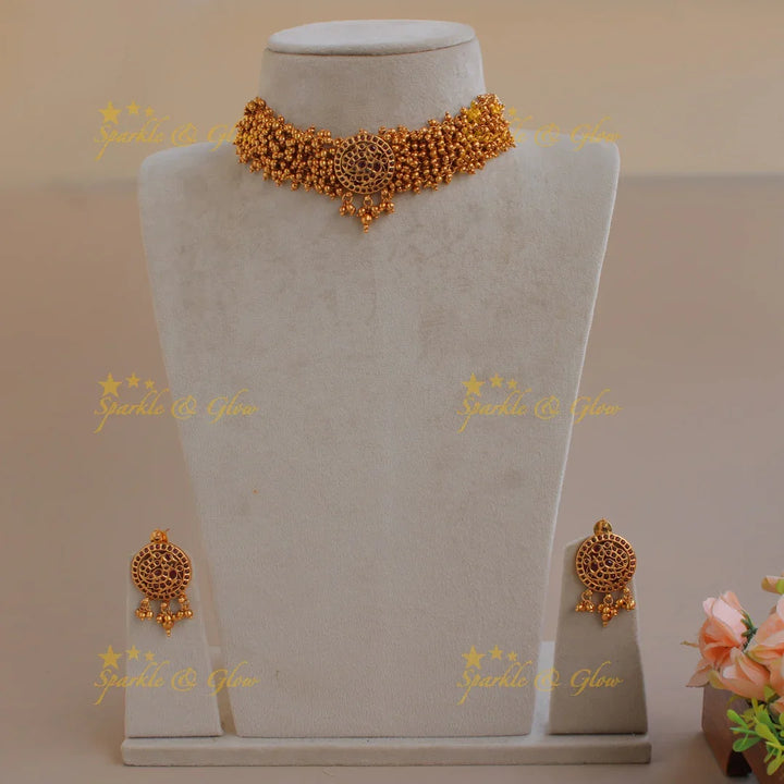 Elegant peacock choker with gold beads cluster - Sparkle and Glow