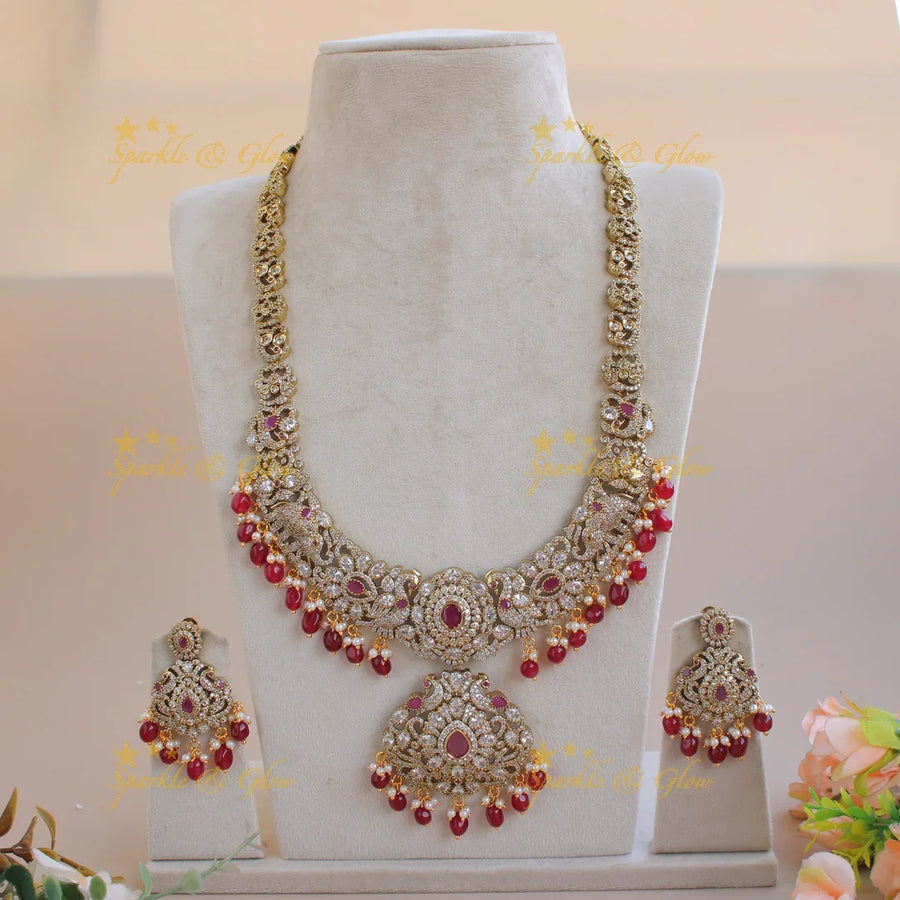 Grand intricate Floral Peacock Elephant design Victorian AD long necklace with ruby pearls and red beads - Sparkle and Glow