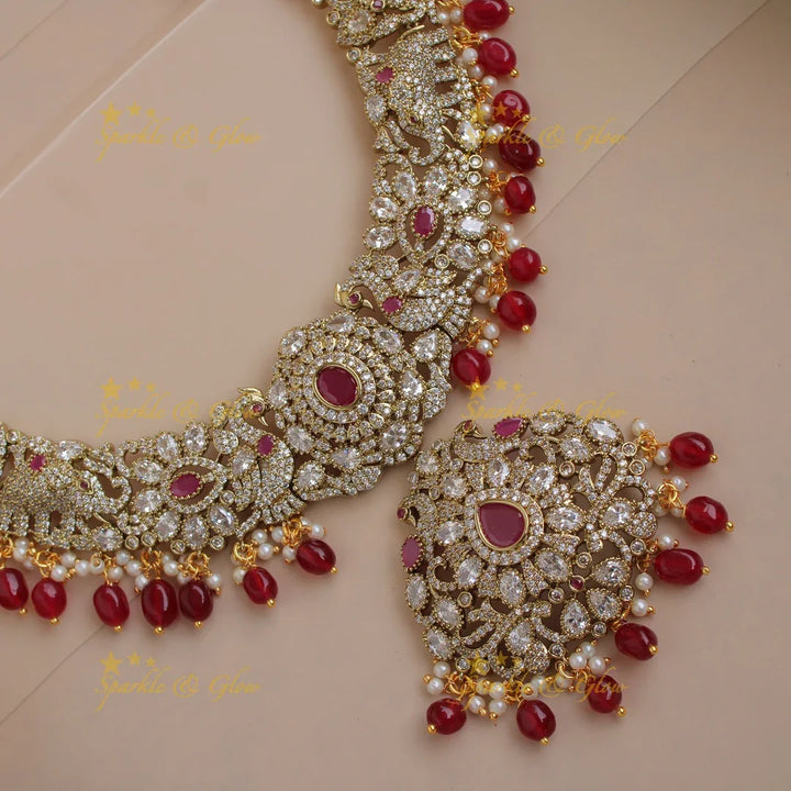 Grand intricate Floral Peacock Elephant design Victorian AD long necklace with ruby pearls and red beads - Sparkle and Glow