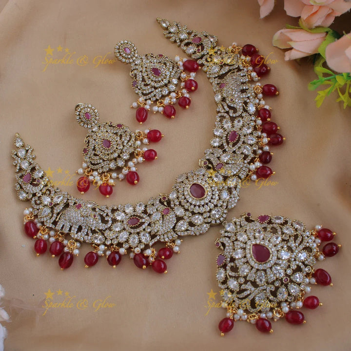 Beautiful Floral Peacock Elephant design Victorian AD short necklace with ruby pearls and red beads - Sparkle and Glow