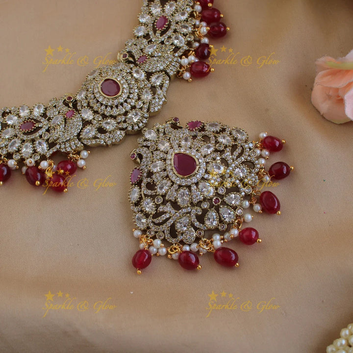 Beautiful Floral Peacock Elephant design Victorian AD short necklace with ruby pearls and red beads - Sparkle and Glow