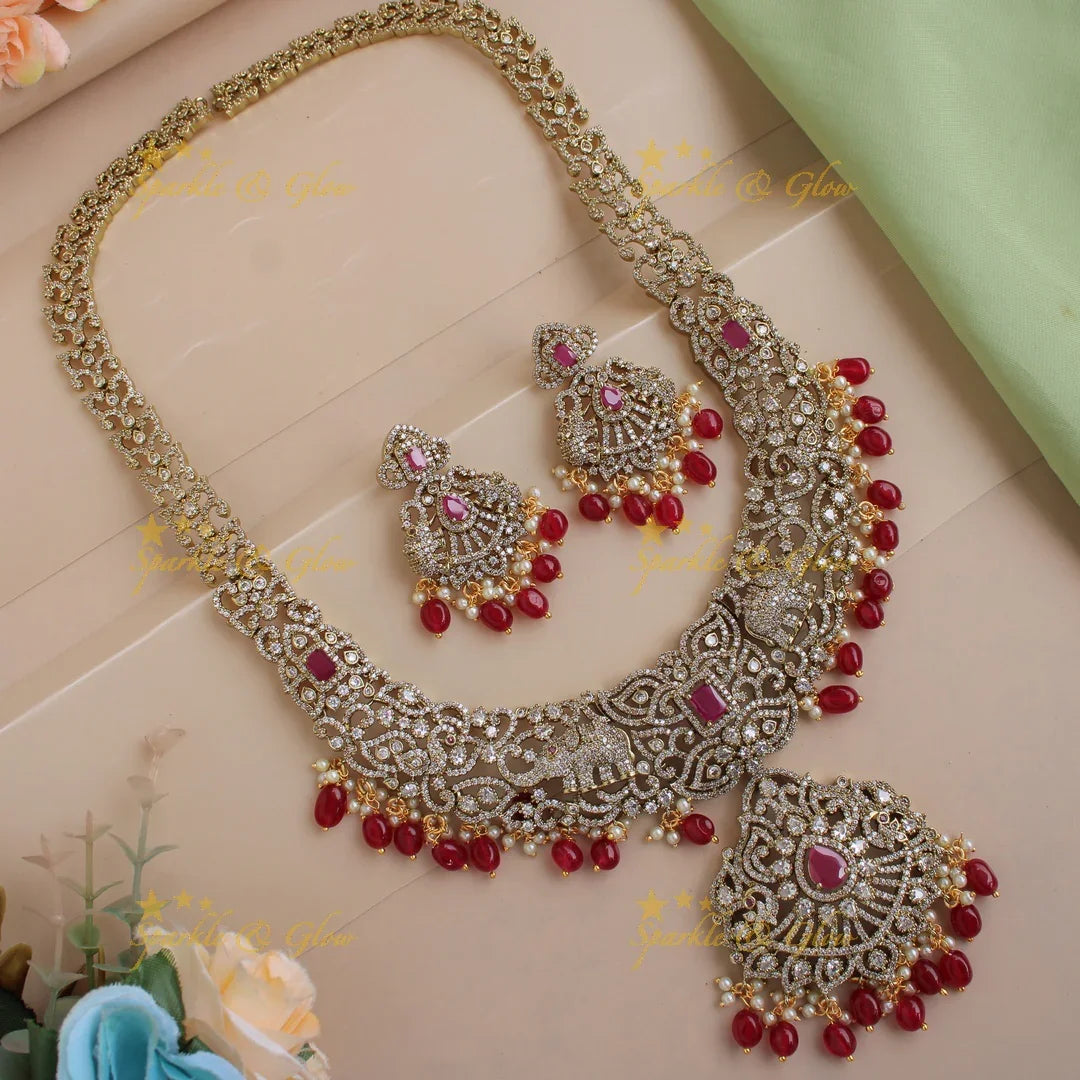 Exclusive grand Floral Elephant Peacock design Victorian AD long necklace with ruby pearls and red beads - Sparkle and Glow