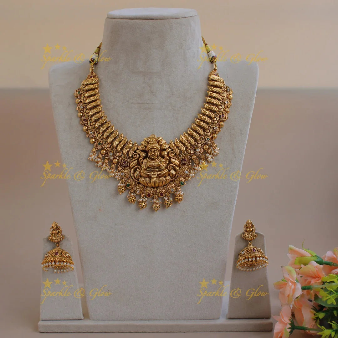 Exquisite Premium matt Lakshmi peacock short necklace with pearls and gold beads - Sparkle and Glow