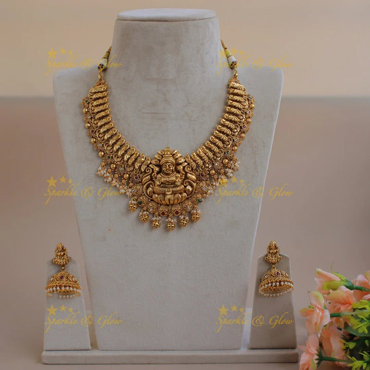 Exquisite Premium matt Lakshmi peacock short necklace with pearls and gold beads - Sparkle and Glow