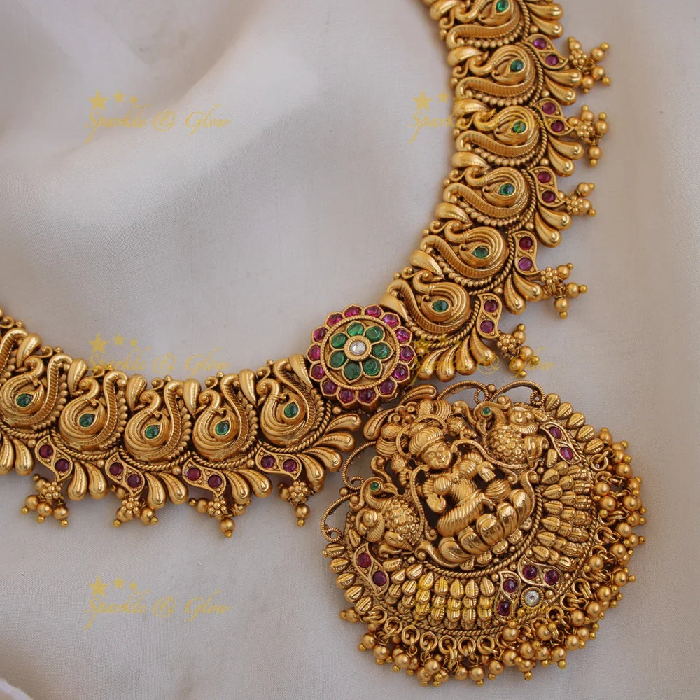 Exquisite Premium matt Lakshmi peacock carved short necklace with ruby emerald and gold beads - Sparkle and Glow