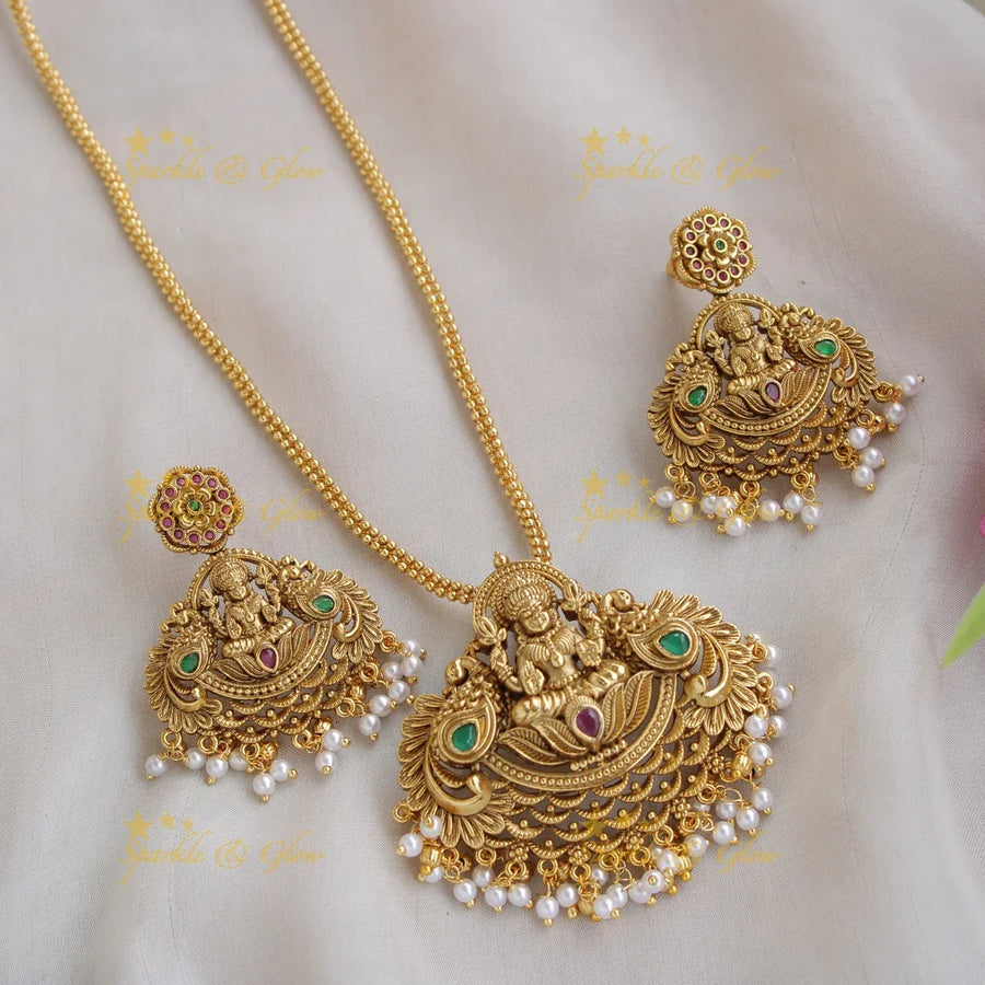 Gold Alike Lakshmi peacock carved pendent with chain with pearls - Sparkle and Glow