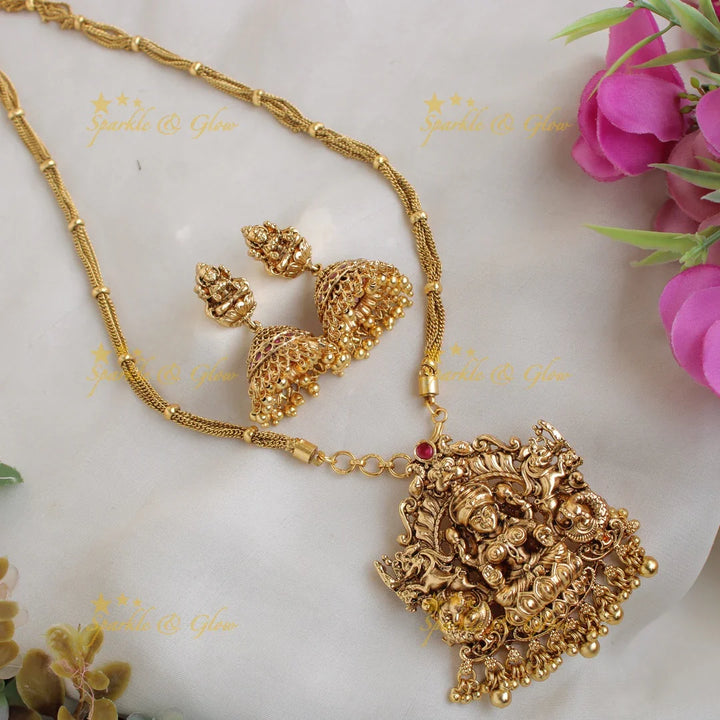 Beautiful Lakshmi peacock carved pendent with chain with gold beads - Sparkle and Glow