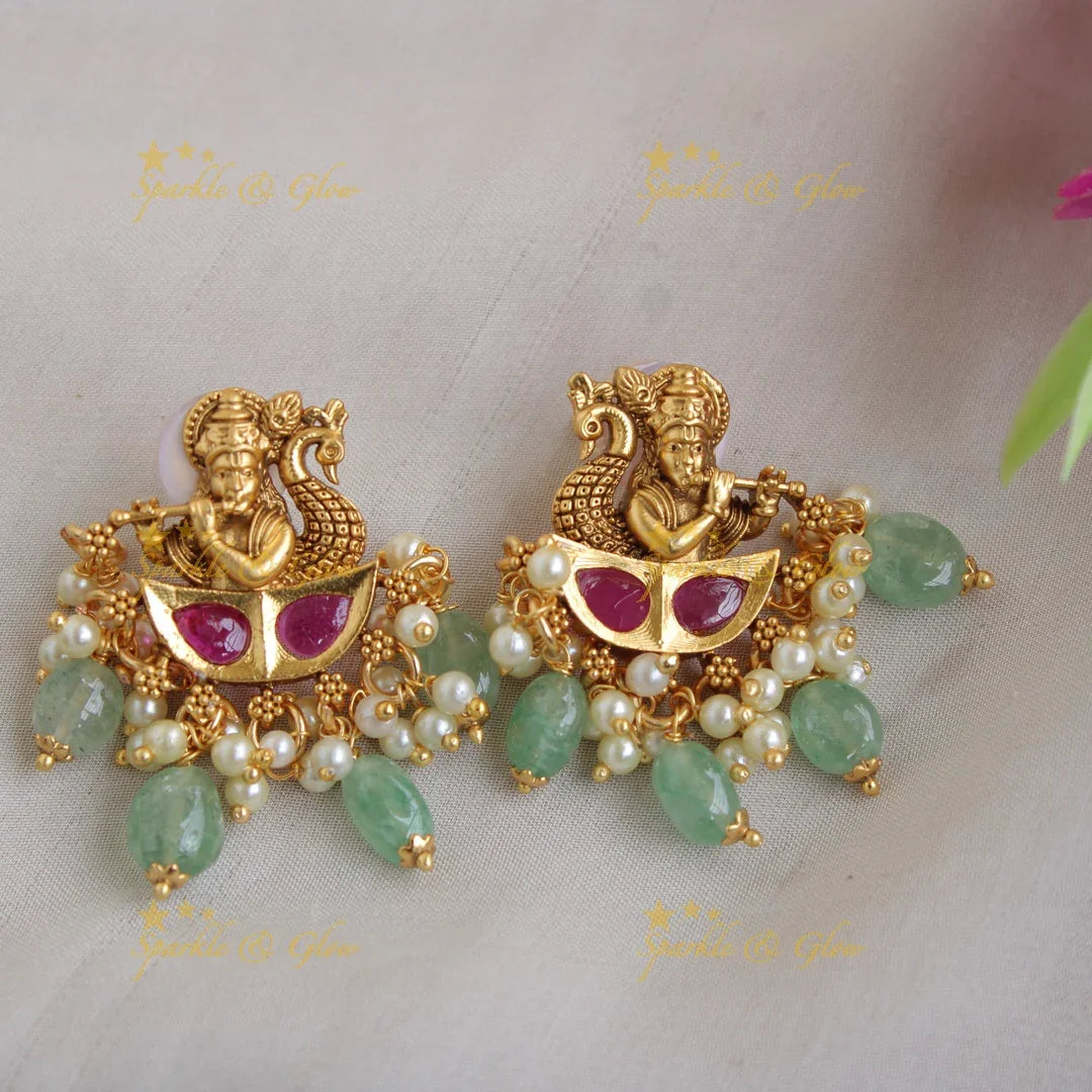 Gorgeous Krishna playing flute and peacock carved pendent with chain with stones and mint green beads - Sparkle and Glow