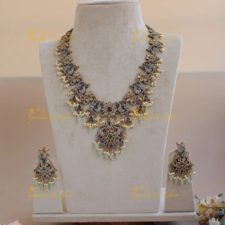 Stunning Floral Peacock design gutta pusalu Victorian AD long necklace with mint green beads - Sparkle and Glow