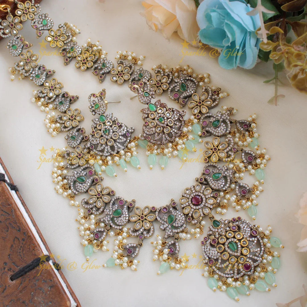 Stunning Floral Peacock design gutta pusalu Victorian AD long necklace with mint green beads - Sparkle and Glow