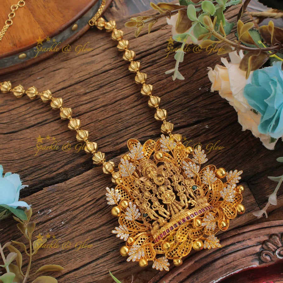Gold Alike Intricate Ganesha carved pendent with chain with CZ stones - Sparkle and Glow
