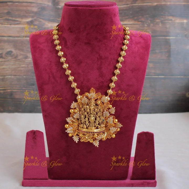 Gold Alike Intricate Ganesha carved pendent with chain with CZ stones - Sparkle and Glow