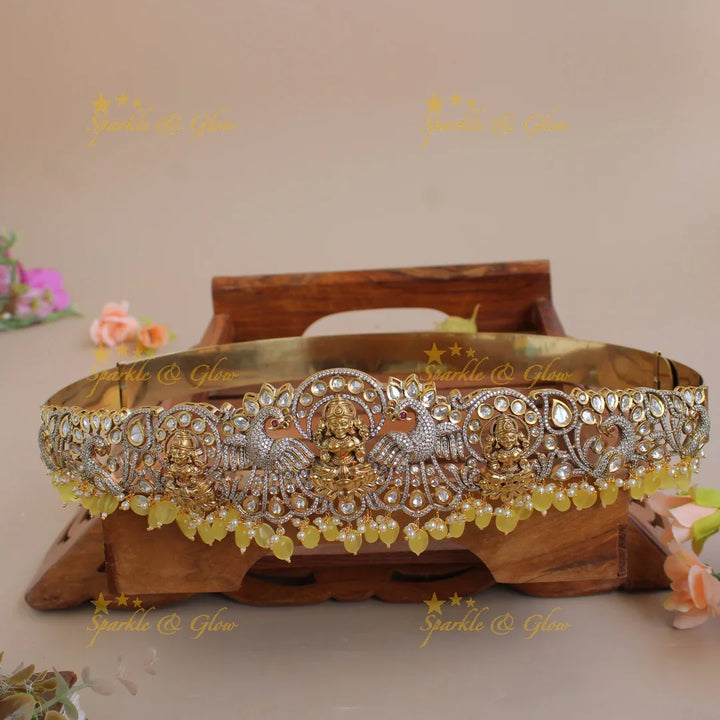 Exclusive Lakshmi peacock carved silver and gold finish victorian ad hipbelt with pearls and baby pink beads - Sparkle and Glow