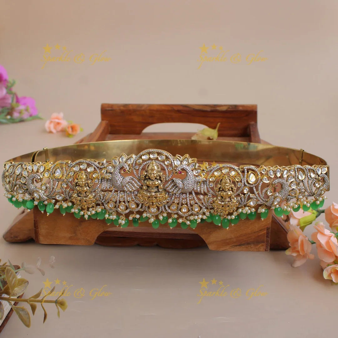 Exclusive Lakshmi peacock carved silver and gold finish victorian ad hipbelt with pearls and baby pink beads - Sparkle and Glow