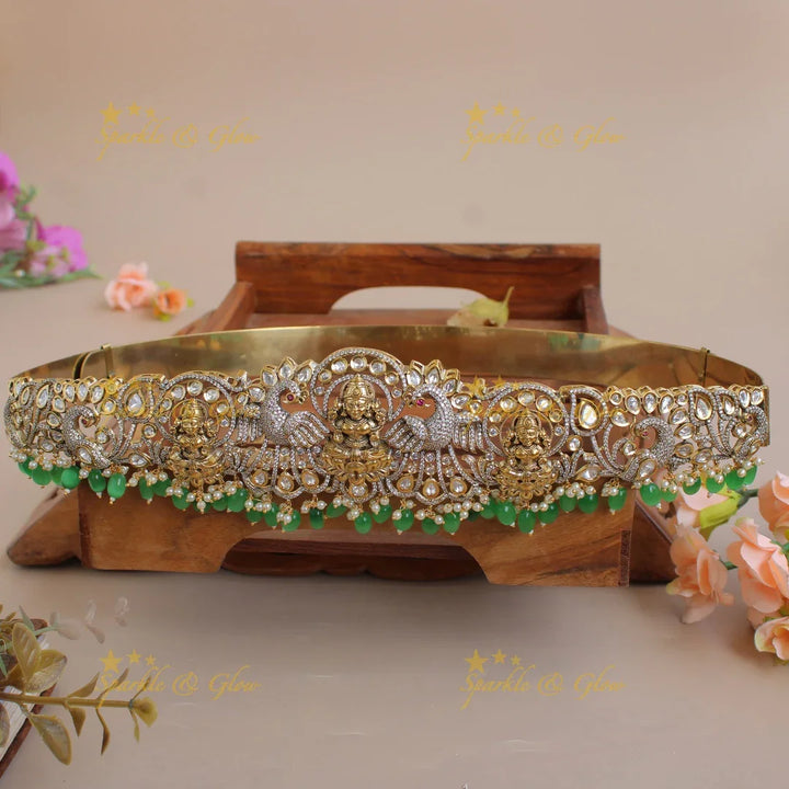 Exclusive Lakshmi peacock carved silver and gold finish victorian ad hipbelt with pearls and baby pink beads - Sparkle and Glow