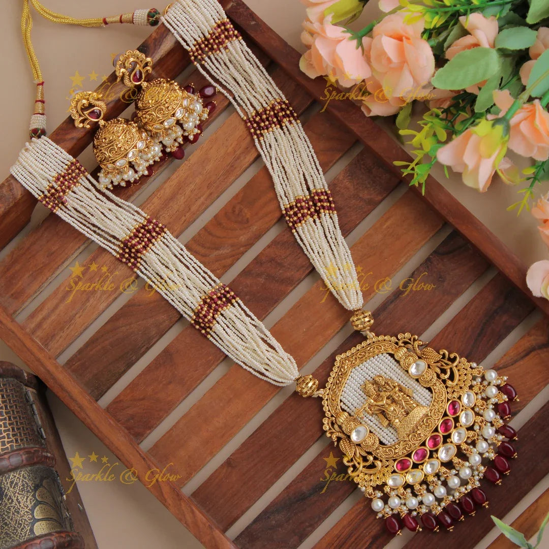 Statement Radha Krishna jadau pendent haram with multi layer pearl chain and maroon beads - Sparkle and Glow