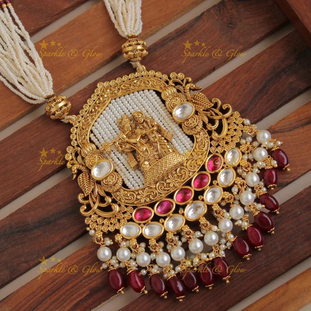 Statement Radha Krishna jadau pendent haram with multi layer pearl chain and maroon beads - Sparkle and Glow