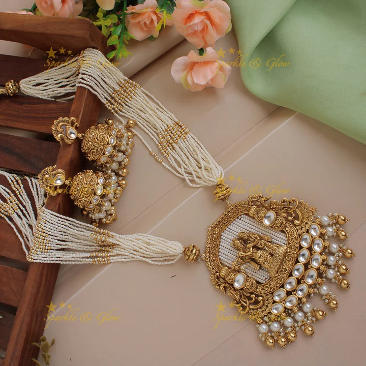 Statement Radha Krishna jadau pendent haram with multi layer pearl chain and maroon beads - Sparkle and Glow