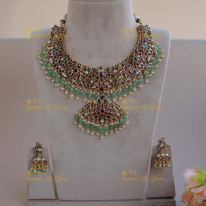 Grand intricate Floral peacock kemp stone short necklace with pearls and mint green beads - Sparkle and Glow