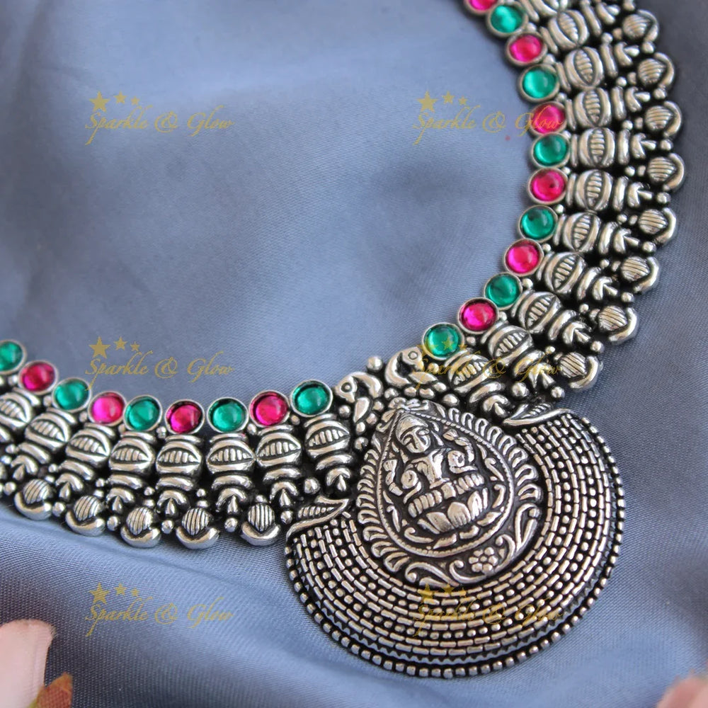 Exclusive Kohlapuri oxidised Lakshmi peacock carved unique design silver short necklace - Sparkle and Glow
