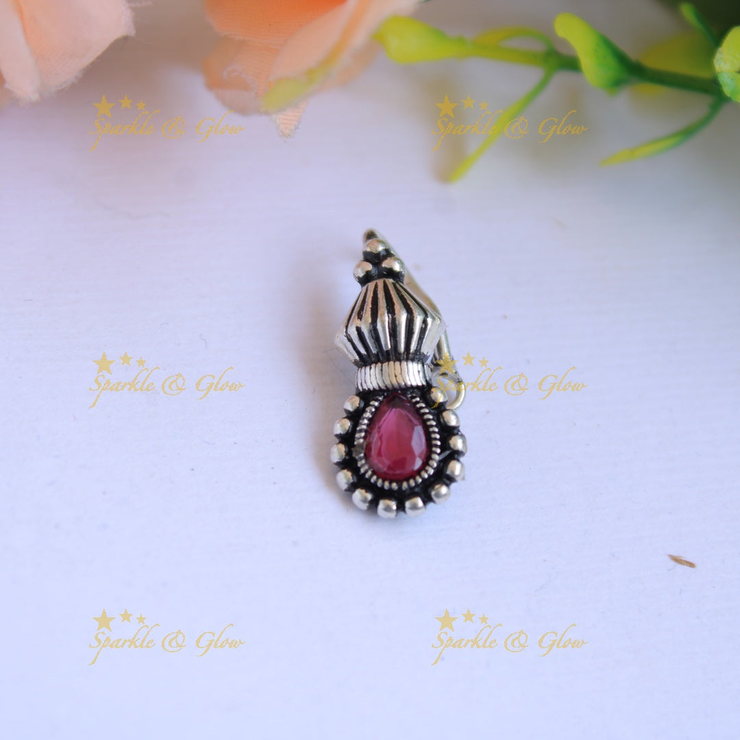 Elegant oxidised silver unique design nose pin with ruby