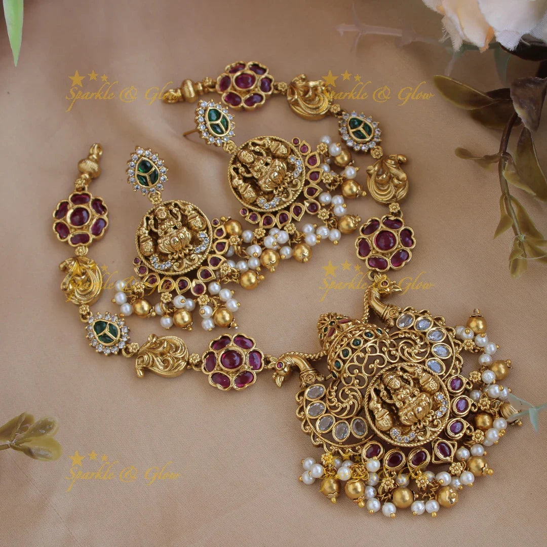 Elegant Lakshmi peacock carved floral short necklace with ruby emerald and pearls and gold beads - Sparkle and Glow