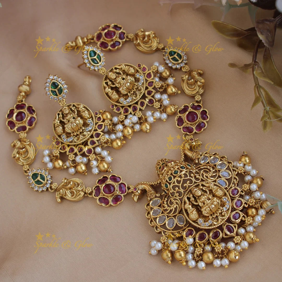 Elegant Lakshmi peacock carved floral short necklace with ruby emerald and pearls and gold beads - Sparkle and Glow