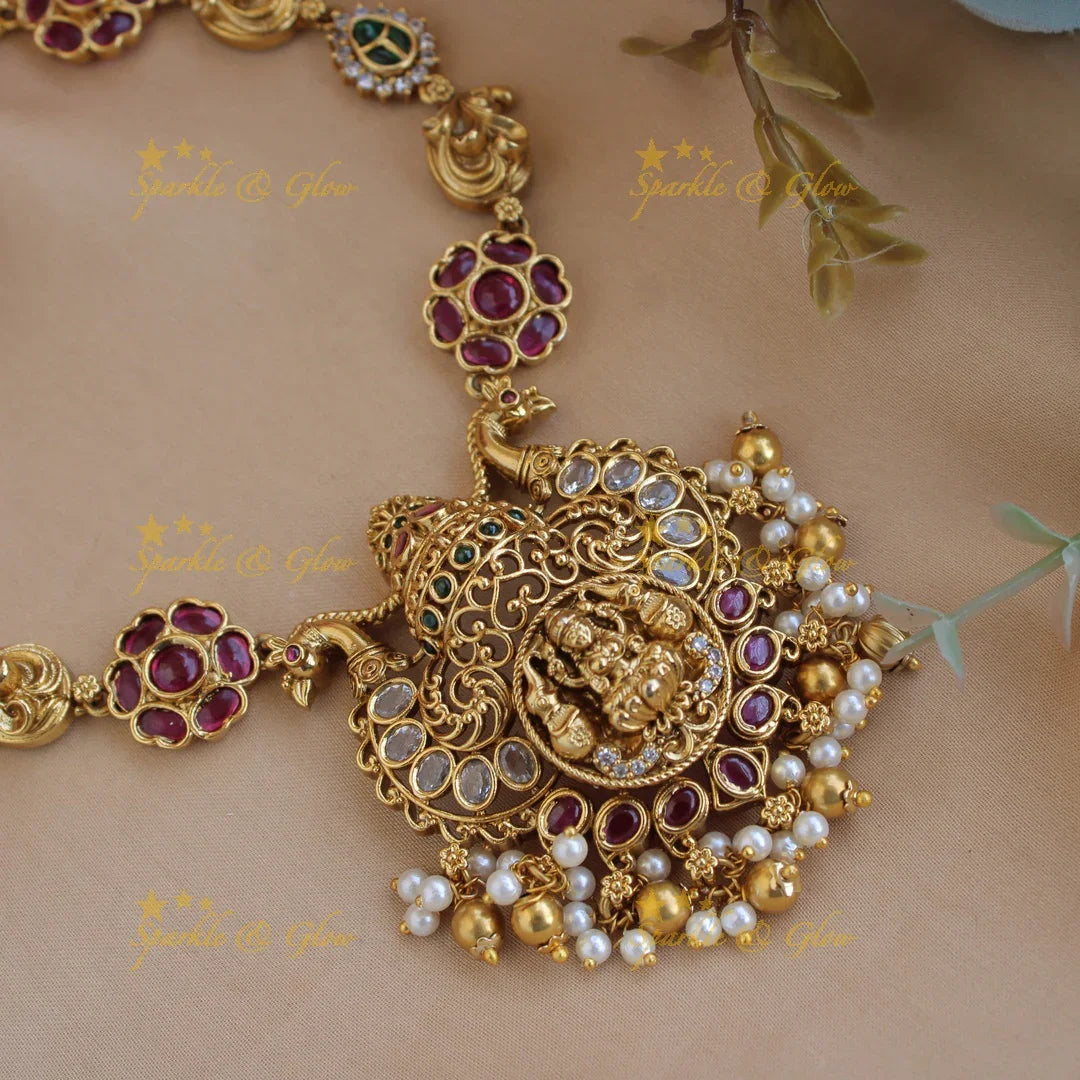 Elegant Lakshmi peacock carved floral short necklace with ruby emerald and pearls and gold beads - Sparkle and Glow